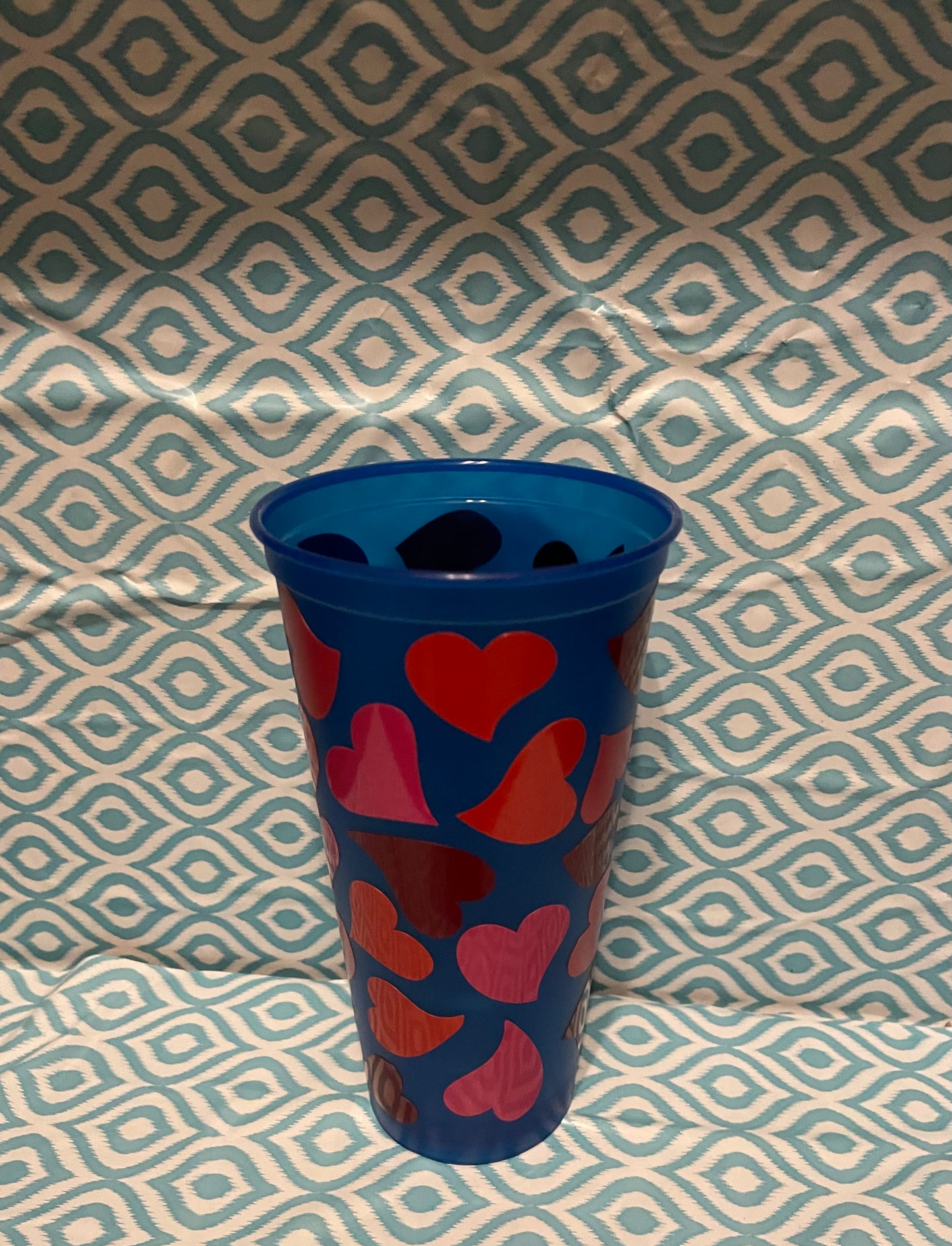 Red and pink hearts cold cup blue