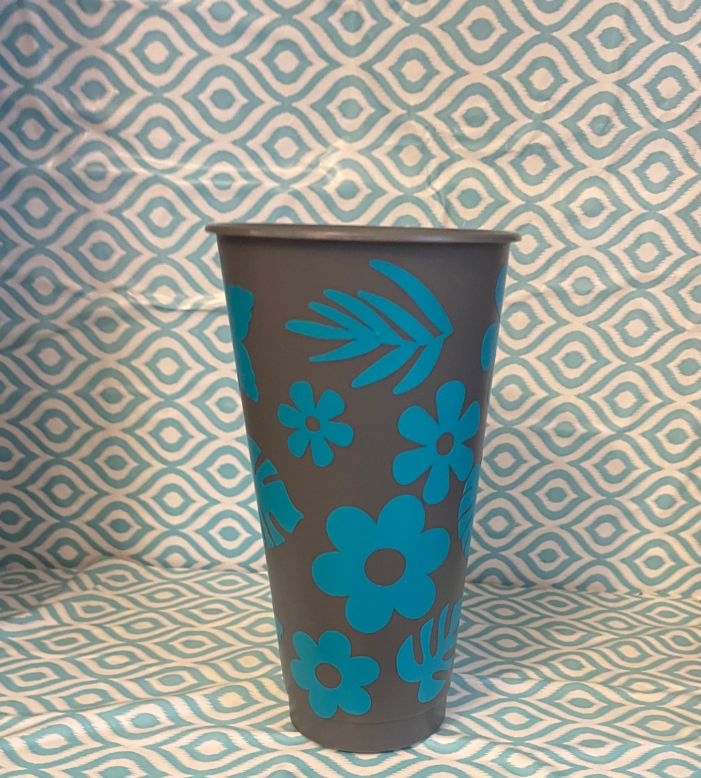 Teal flowers and leaves cold cup gray