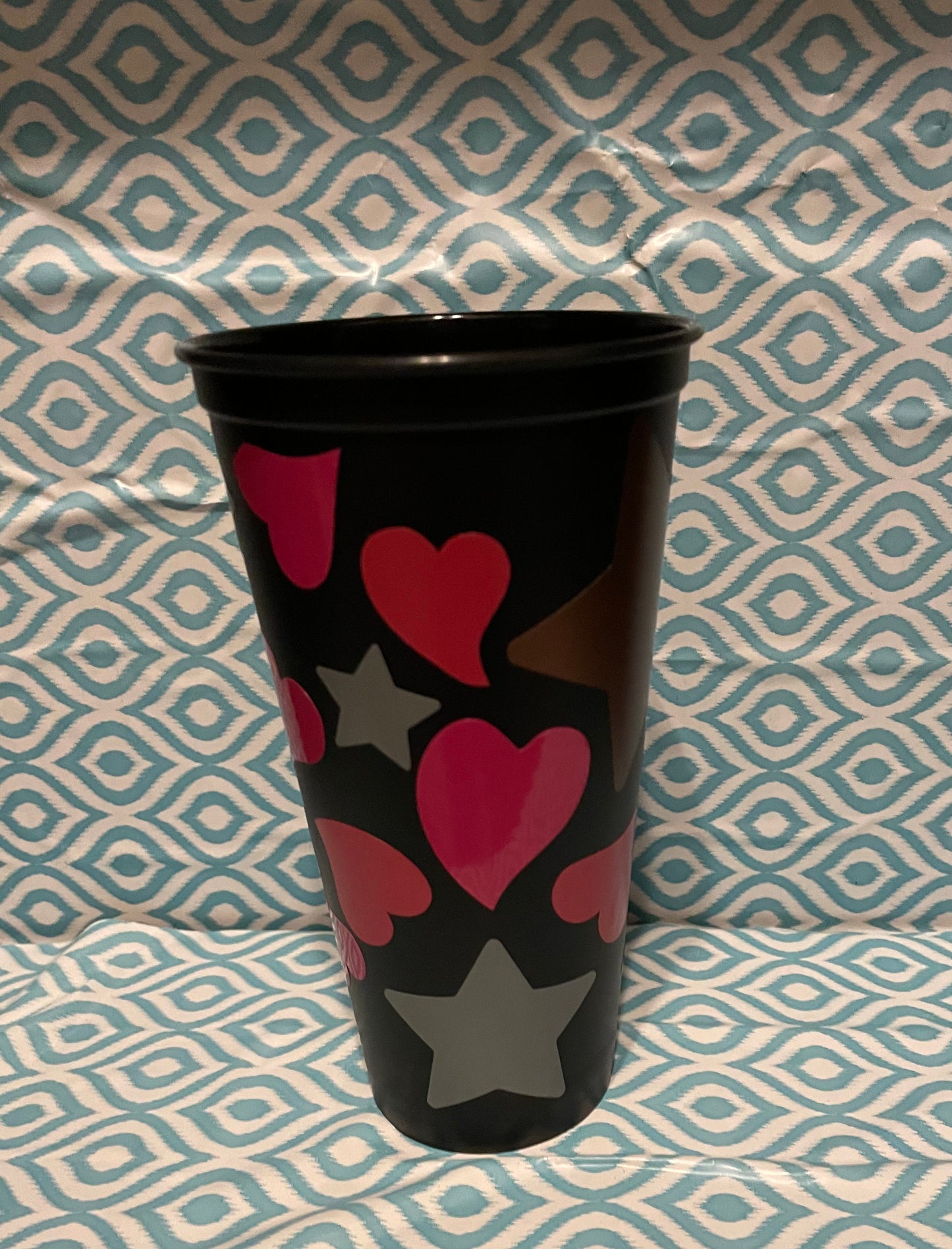 Gold silver stars with hearts cold cup black