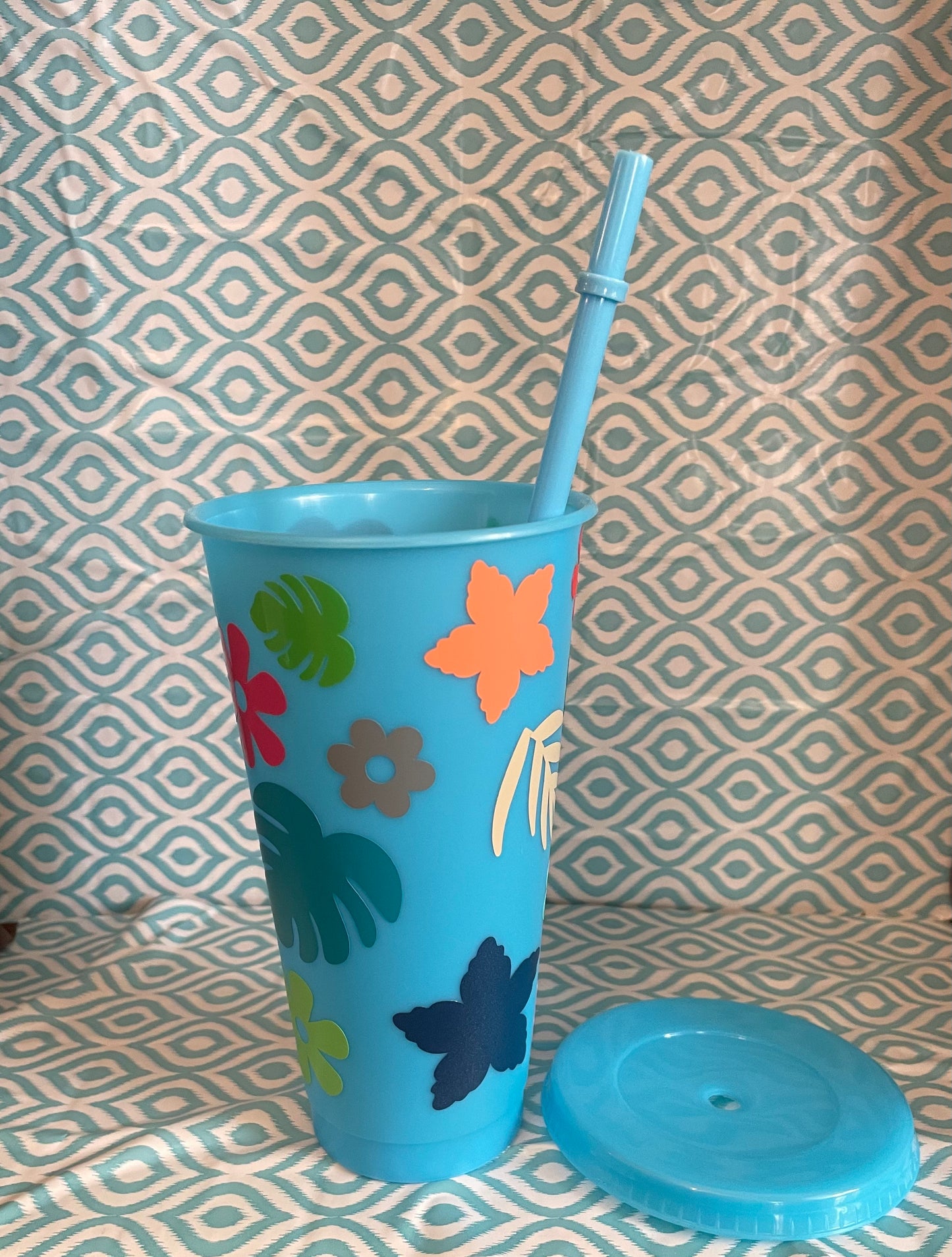 Flowers and leaves light blue cold cup