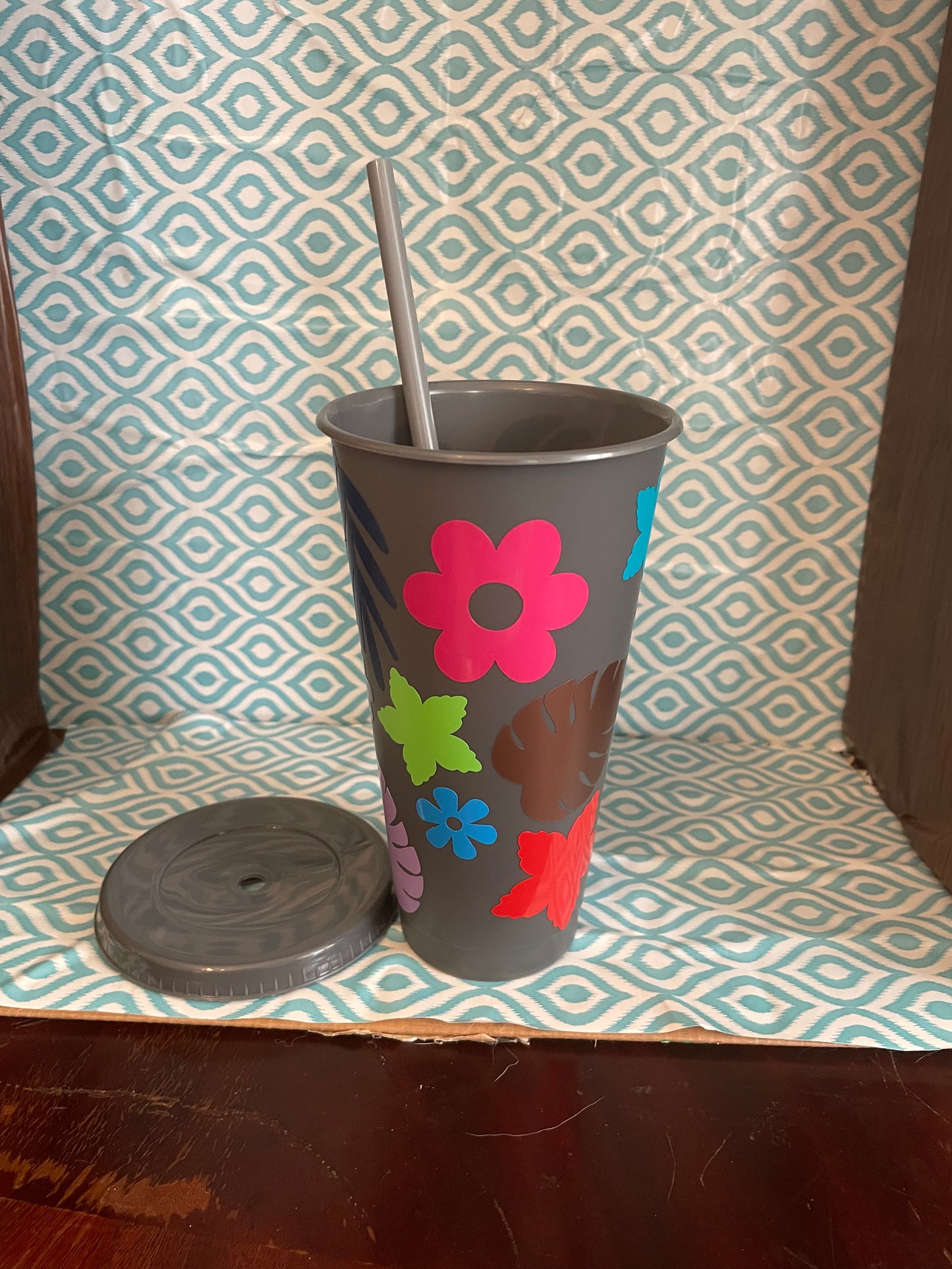 Flowers and leaves gray cold cup