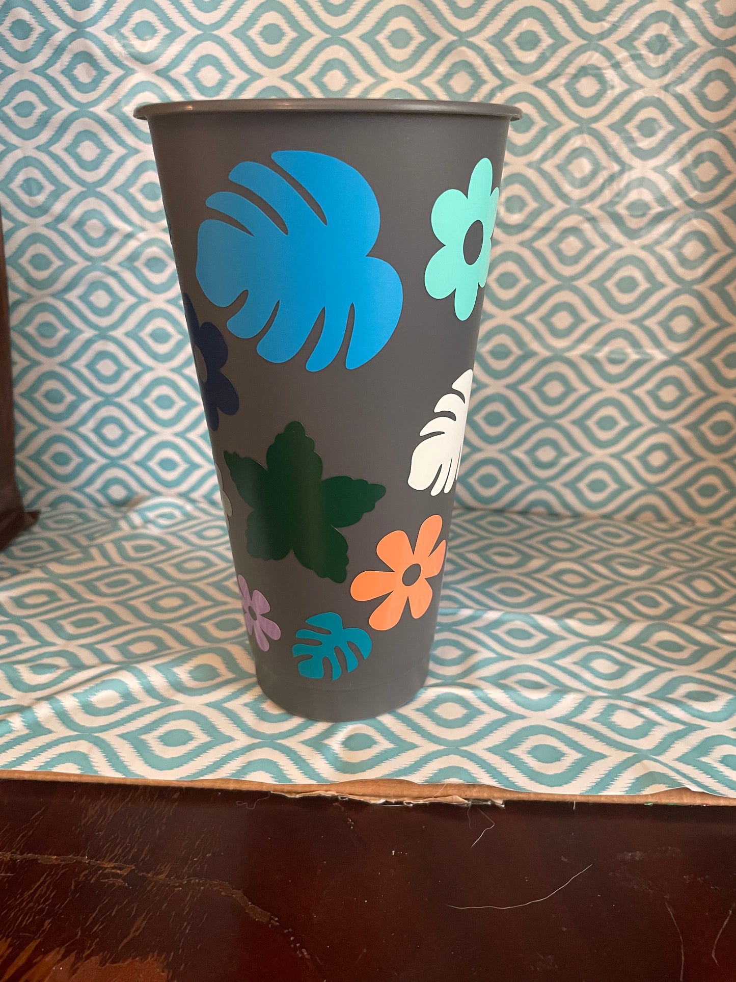 Flowers and leaves gray cold cup