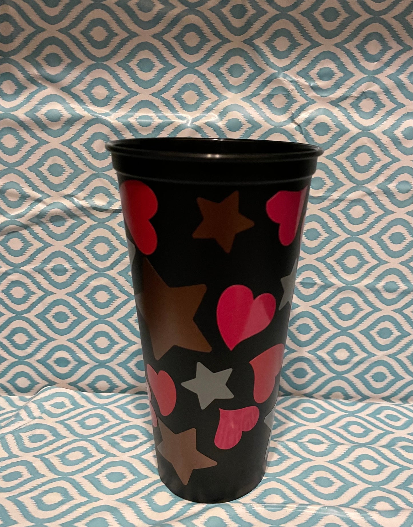 Gold silver stars with hearts cold cup black