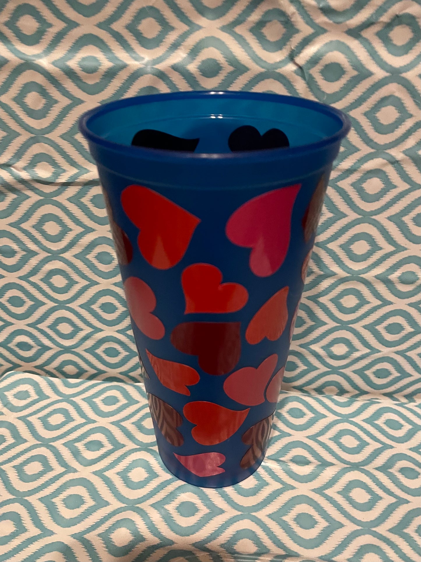 Red and pink hearts cold cup blue