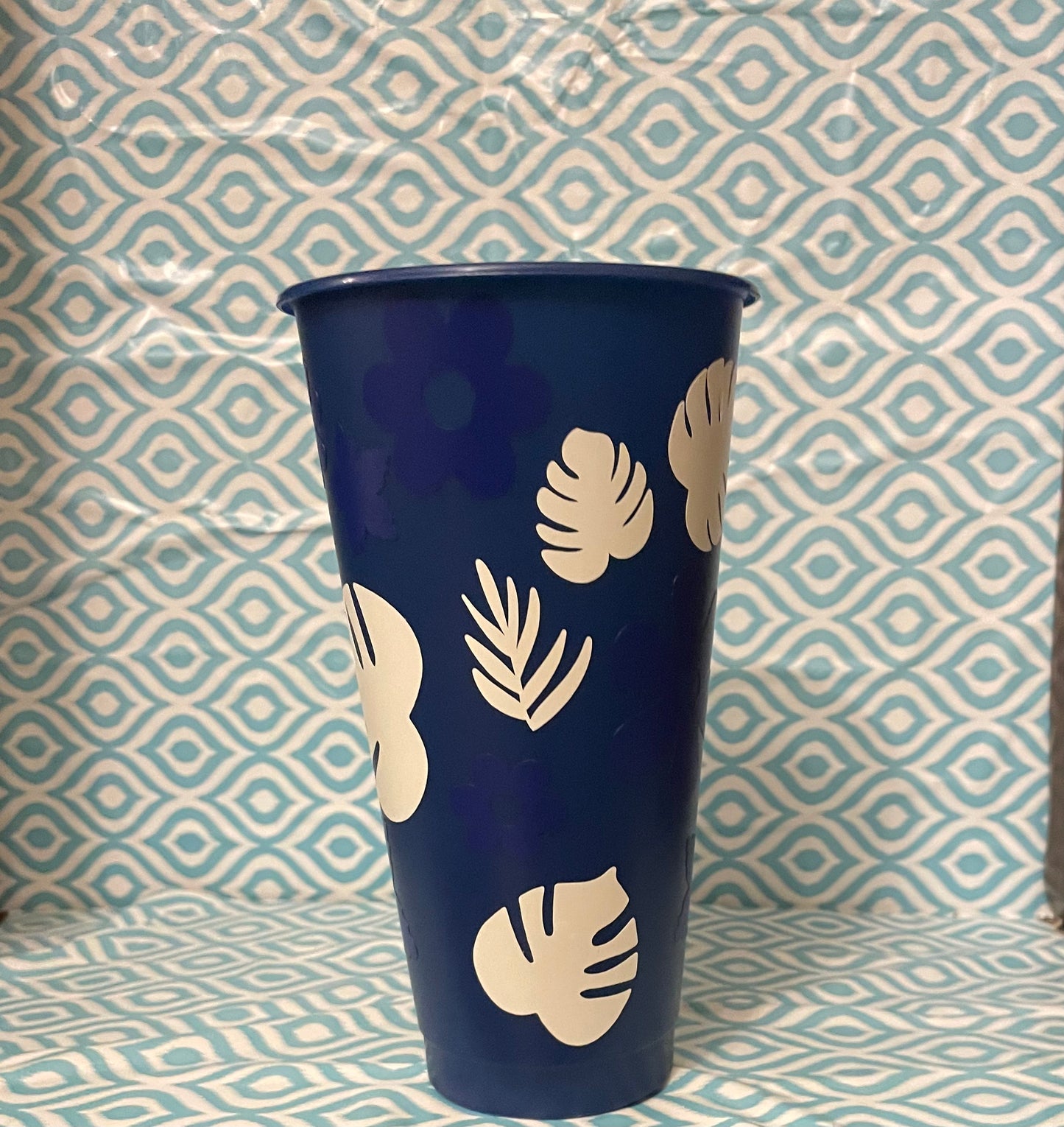 Blue flowers white leaves cold cup navy