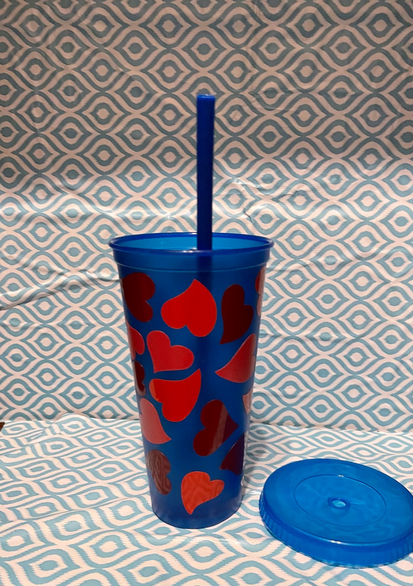 Red and pink hearts cold cup blue