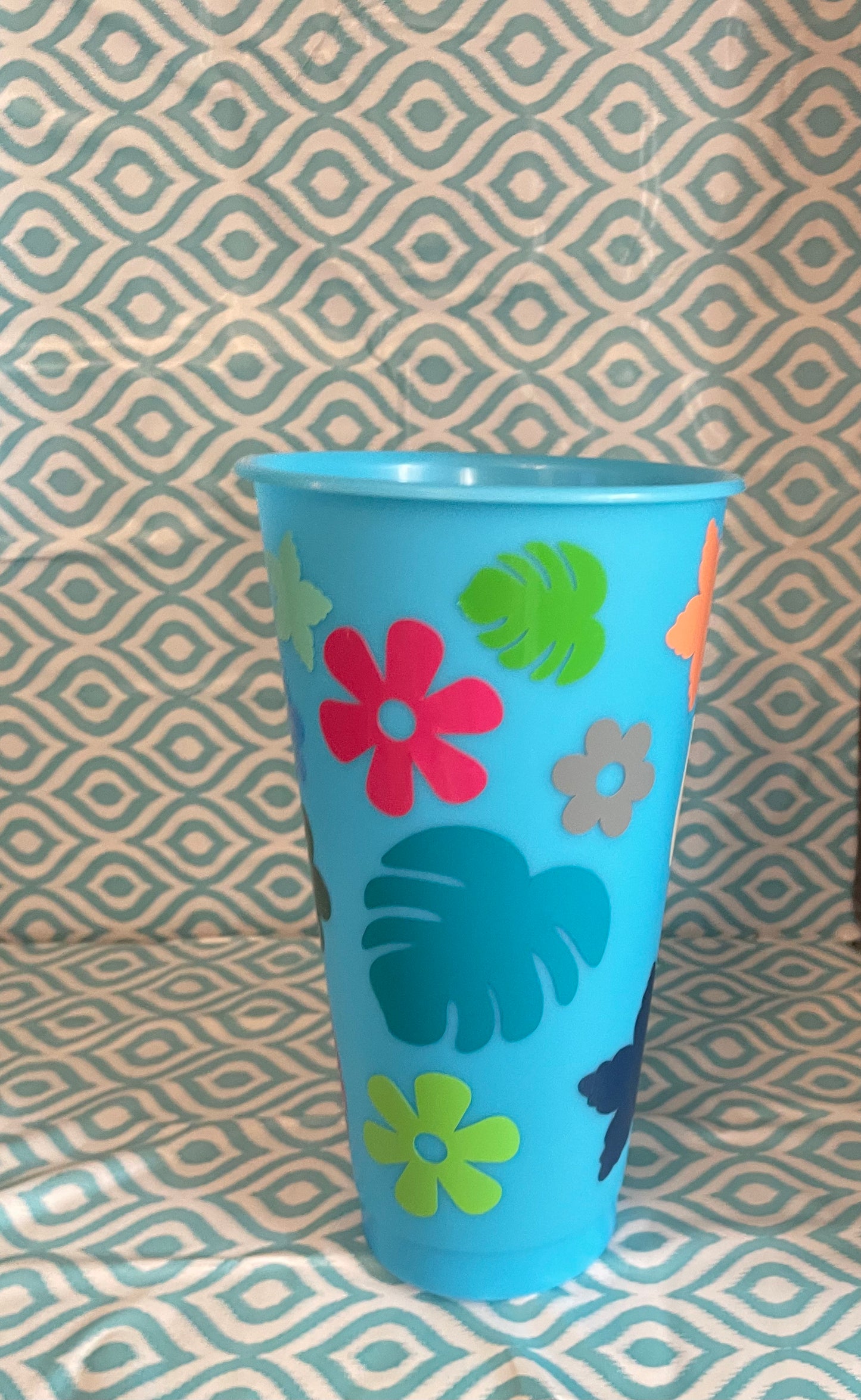 Flowers and leaves light blue cold cup