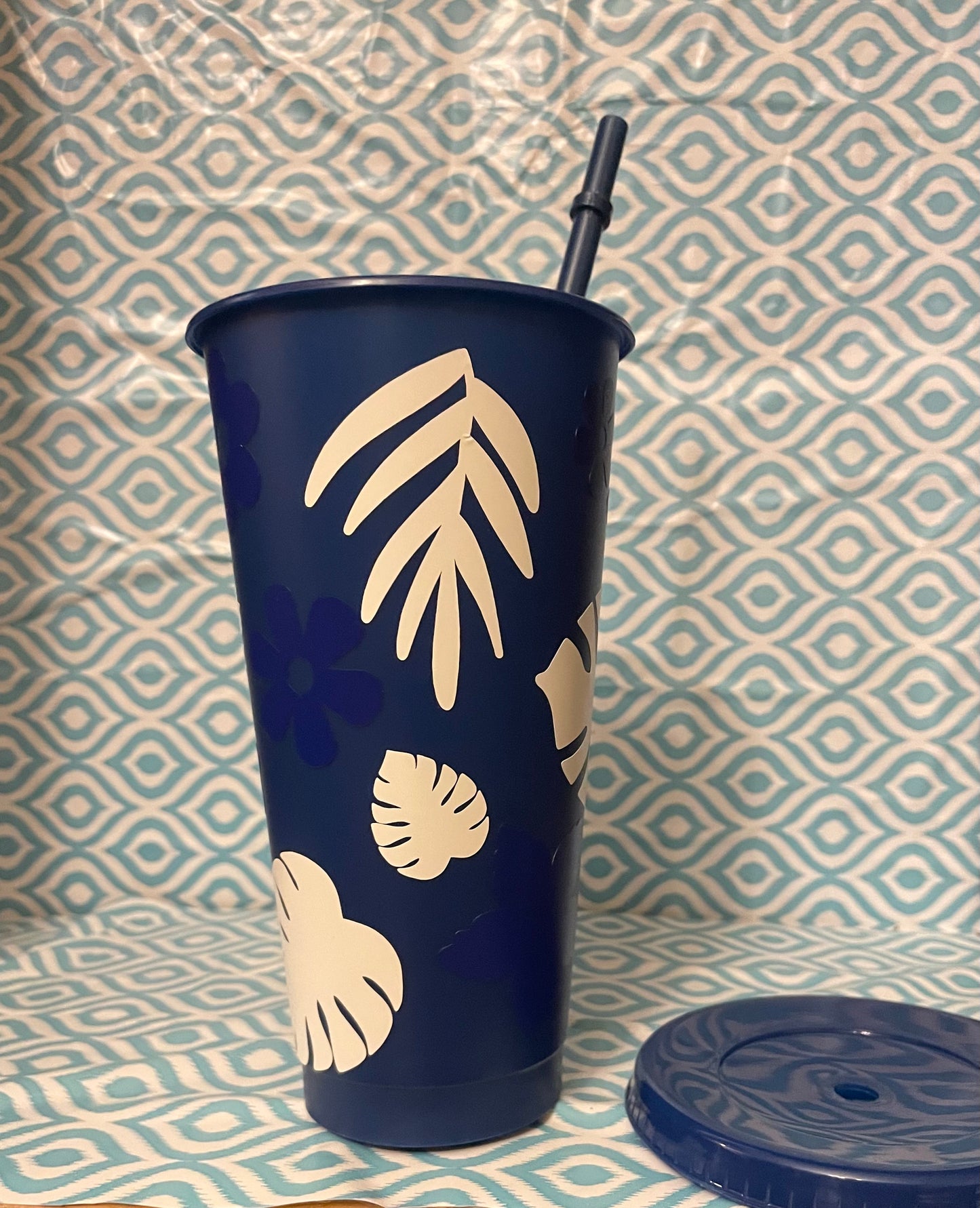 Blue flowers white leaves cold cup navy