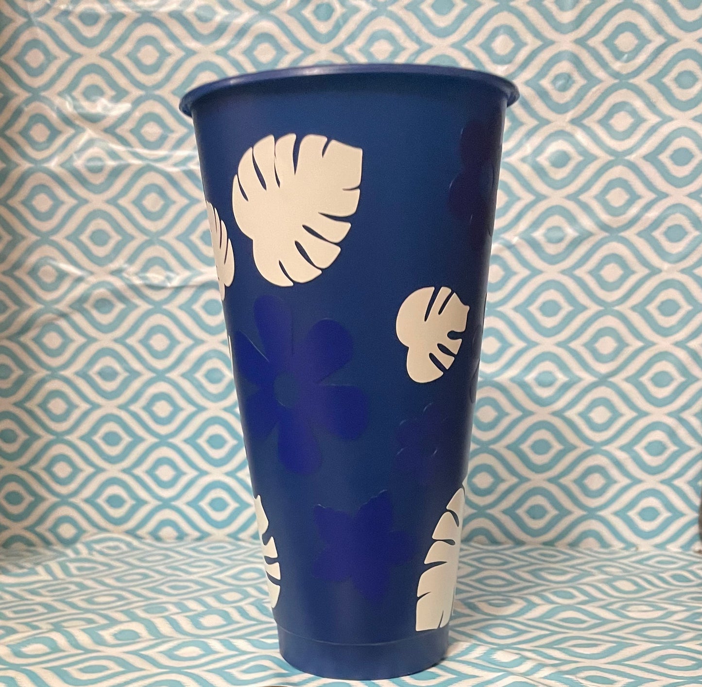 Blue flowers white leaves cold cup navy